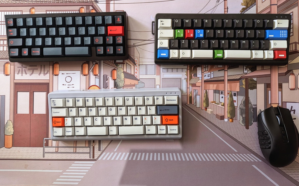 Assorted 40% keyboards with minimalist layouts and reduced alphanumeric key sets, shown for comparison.