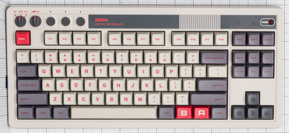 8BitDo Retro Mechanical Keyboard, a TKL layout with arrow keys and navigation keys but no numpad.