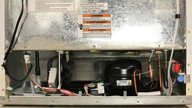 Whirlpool WRT311FZDW Machine Compartment Photo